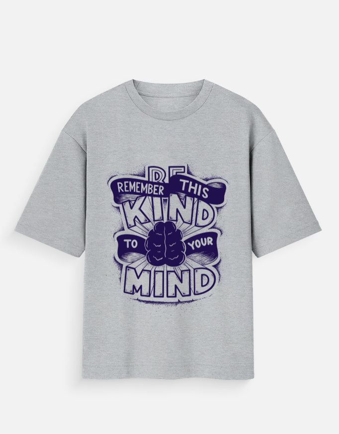 Grey t-shirt featuring a purple graphic print with text 'Be Kind To Your Mind' and a brain icon.