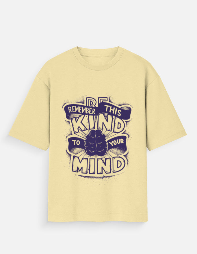 Cream t-shirt with blue graphic typography and brain illustration reading Be Kind To Your Mind